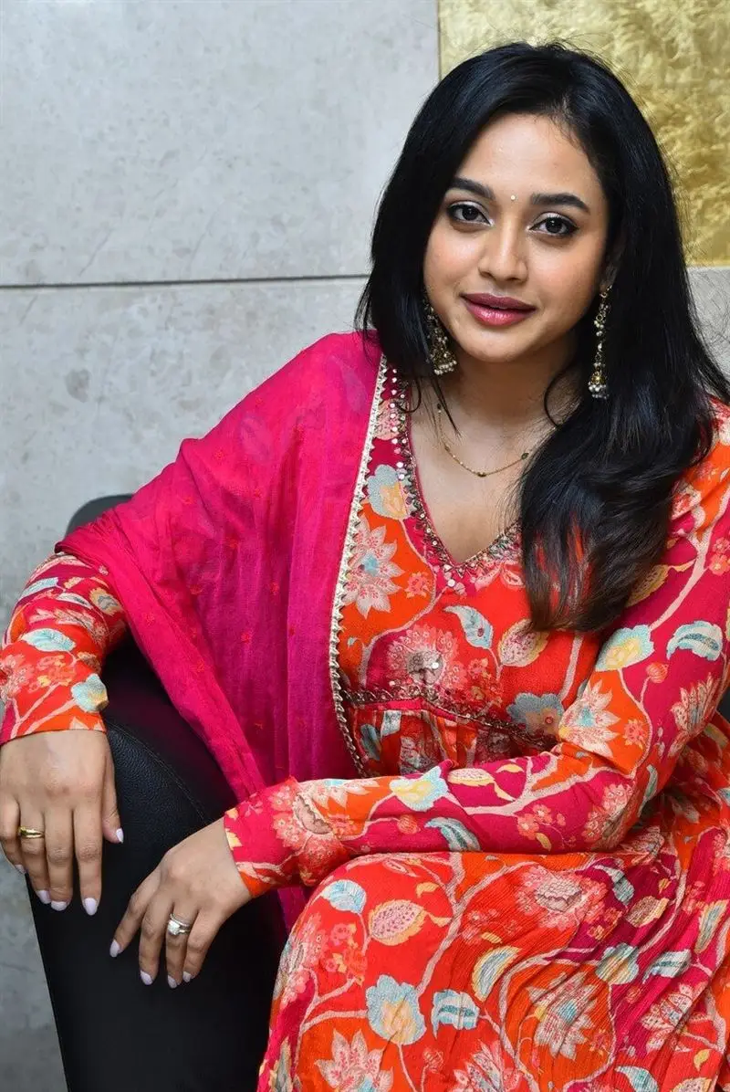 Telugu Girl Yasha Shivakumar in Orange Dress